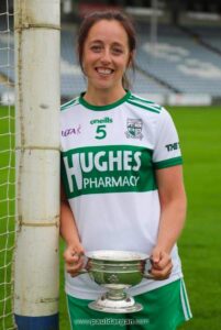Aisling Saunders Portlaoise holding the Laois Ladies' Senior Championship trophy