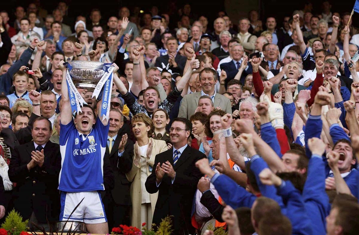 Portlaoise player and Laois captain Ian Fitzgerald lifts the Jack Delaney cup in 2003.