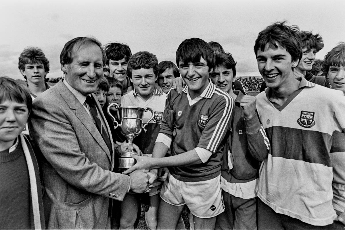 Eddie Brennan receiving the minor football trophy